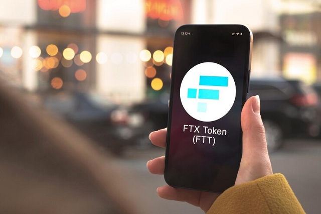 écran de téléphone montrant le logo ftx